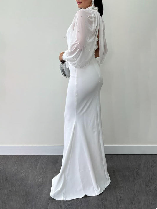 Платье-комбинезон из двух частей с открытой спиной, прозрачной отделкой и бисером, на бретелях.