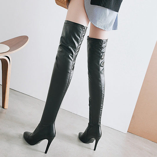 Высокие эластичные сапоги на каблуке выше колена